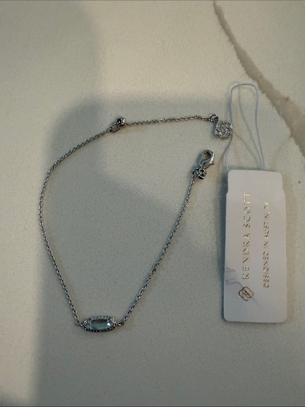 Kendra Scott Silver Bracelet with Light Blue Stone